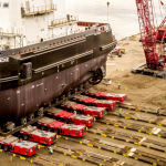 laminated wood mats for transporting a ship